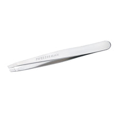 Tweezerman stainless steel slant tweezer close-up with precision tips for hair removal