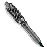 TYMO Stylux thermal brush front view for effortless glide and smooth blowouts at home.