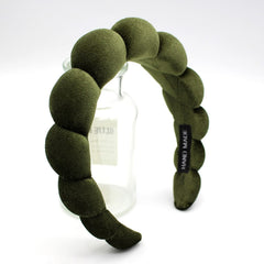 Uchyius headband close-up shows velvet wrap for soft, gentle contact.