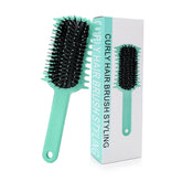 UHACLWS Curly Brush volume-defining bristles for smooth detangling.