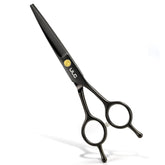 ULG professional hair cutting scissors close-up blades show ultra sharp edges for clean cuts.
