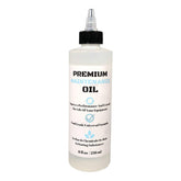 UniKitchen Premium Lubricating White Oil 8oz bottle for shavers and clippers; reduces friction and prevents rust.