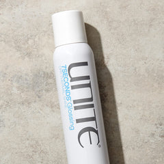 UNITE 7SECONDS Glossing Spray mist conveying light, airy application for smooth hair.