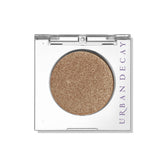 Urban Decay 24/7 Eyeshadow Half Baked gold shimmer swatch on lid for radiant color