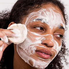 Clarifying mask application with Urban Skin Rx clarifying bar for refined pores.