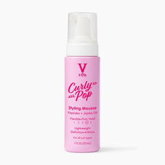 V&Co Curly Pop Mousse frente a la botella, definición suave para rizos