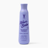 V&Co Wave Babe shampoo bottle on shelf showing frizz-control promise