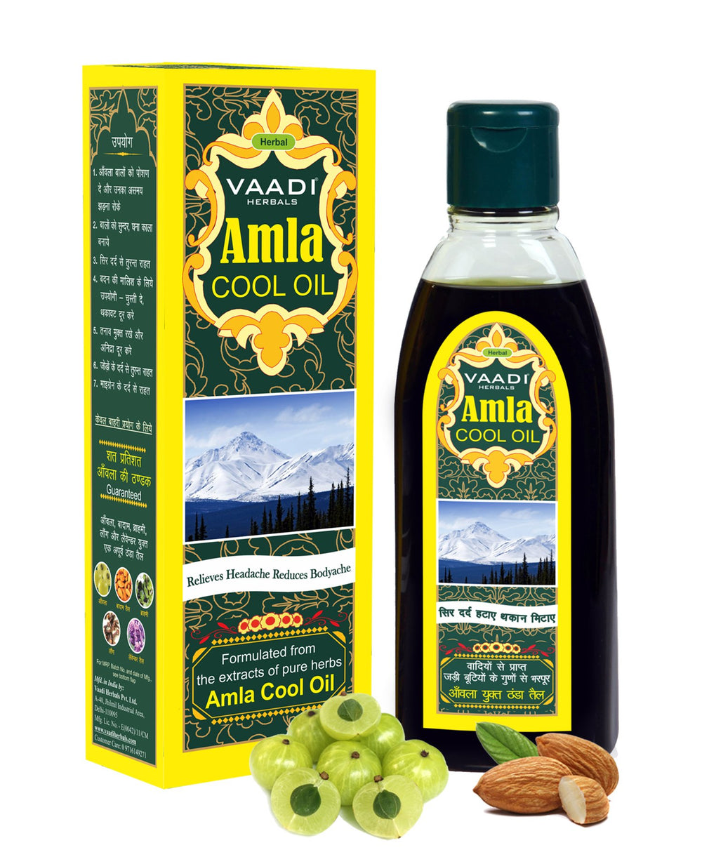Vaadi Herbals Amla-Brahmi Hair Oil pour for cooling scalp nourishment.