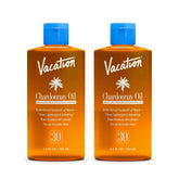 Vacation Chardonnay Oil SPF 30 Duo: two travel bottles showcased for on-the-go sun protection.