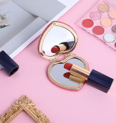 ValueBargain magnetic folding mirror stands upright for hands-free grooming.