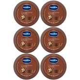 Paquete de seis cremas corporales Vaseline Cocoa Glow para hidratación suave.