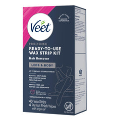 Close-up of Veet wax strip being applied to leg hair