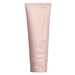 VEGAMOUR GRO Revitalizing Conditioner bottle showing smoother, shinier hair due to hydration