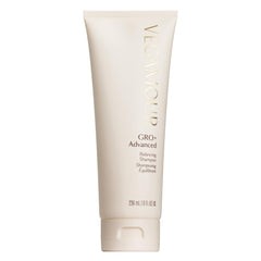 VEGAMOUR GRO+ Balancing Shampoo bottle pouring to cleanse scalp and remove buildup.