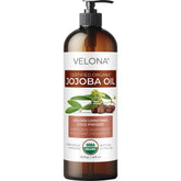 Velona Jojoba Oil bottle with pump for easy facial and body hydration.