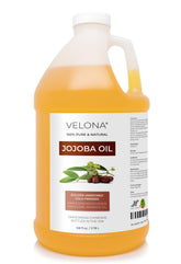 Velona Jojoba Oil gallon bottle close-up, showcasing pure hydration for skin and hair
