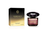 Versace Crystal Noir bottle shines in elegant lighting, ideal for evening wear