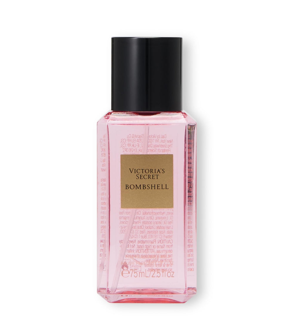 Victoria's Secret Bombshell mini mist bottle pour for a quick fruit-forward refresh.