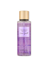 Victoria's Secret Love Spell bottle pour, ideal for daily refreshment.