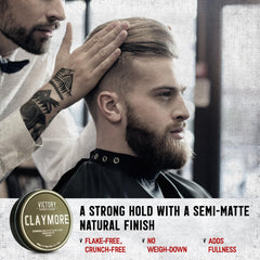Victory Barber Brand Claymore in hand for quick styling touch-ups.