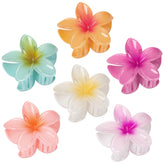 Vigorpace hibiscus flower clip, front view, adds vibrant color for sunny beach-inspired looks.
