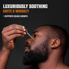 Viking Revolution Coffee Whiskey Beard Oil being used to style facial hair