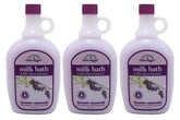 Village Naturals Therapy Ultra-Moist Lavender Chamomile Milk Bath bottle aids hydration and relaxation.