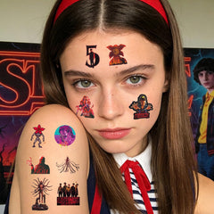 VINYUSE Stranger Things tattoos party use image emphasizes easy application and removal