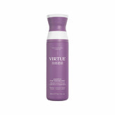 Virtue Flourish Shampoo bottle pours onto hair, purifying the scalp.