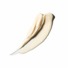 VIRTUE Full Volume Conditioner texture swirl emphasizes creamy lift without weighing hair down.