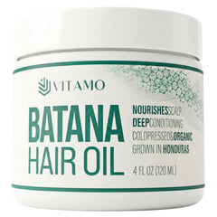 Vitamo Batana oil bottle with pure, cold-pressed formula for hair and scalp care.