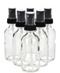 Vivaplex 6-pack 2 oz clear glass bottles with black mist sprayers offer travel convenience.