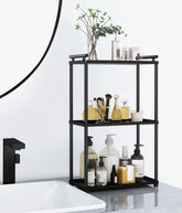 VOTZAAQ 3-tier countertop organizer in matte black keeps cosmetics and toiletries neatly arranged.