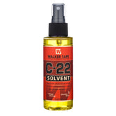Walker Tape C-22 spray bottle for precise adhesive removal on wigs.
