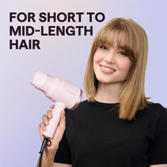 Wavytalk mini hair dryer with folding handle for portable use.