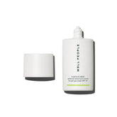 Well People Daygleamer bottle closeup shows silky mineral sunscreen