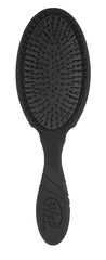 Wet Brush Brush Pro Detangler Black in hand for quick, tangle-free detangling.