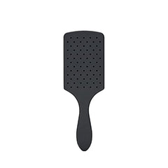 Wet Brush charcoal-infused bristles closeup showing oil absorption.