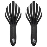 Wet Brush Go Green Curl Detangler brush eases curly hair tangles.