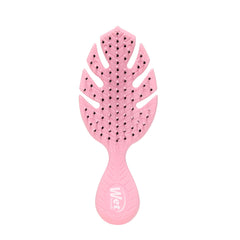 Wet Brush Go Green Mini Detangler Pink handle ready for quick on-the-go detangling