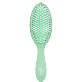 Wet Brush Go Green tea tree oil bottle for refreshing styling.