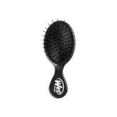 Wet Brush Mini Detangler on the go with IntelliFlex bristles for smooth detangling