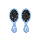 Wet Brush Mini Detangler in Sky front view with flexible bristles gliding through hair