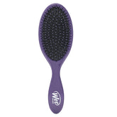 Wet Brush Original Detangler Purple close-up showing gentle detangling for knot-prone hair.