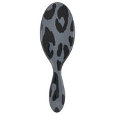 Wet Brush Original Detangler Safari Leopard brush close-up gliding through tangles