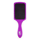 Wet Brush Paddle Detangler purple front view gliding through tangles for gentle detangling.