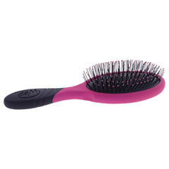 Wet Brush Pro Detangler Pink IntelliFlex bristles flexing to reduce breakage during detangling