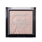 Wet n Wild MegaGlo Highlighting Powder compact swatch shows radiant, pearlescent glow on the skin