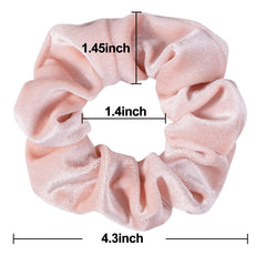 Whaline pink velvet scrunchies tied in a ponytail for gentle, secure hold