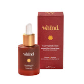 WHIND Marrakech Sun Tinting Water bottle shows portable self-tanner for on-the-go glow.